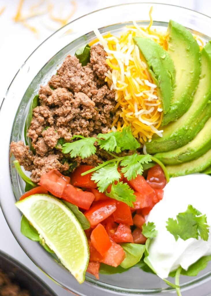 sweetketolife.com-taco-salad-for-keto-ingredients-cheesy-ground-beef